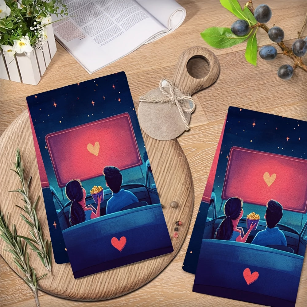 2 pieces of ultra soft kitchen towels featuring a hand drawn illustration of a couple sitting in their car at a drive-in movie theater. They are watching a romantic film on the big screen while sharing a bucket of popcorn. The car's hood is decorated