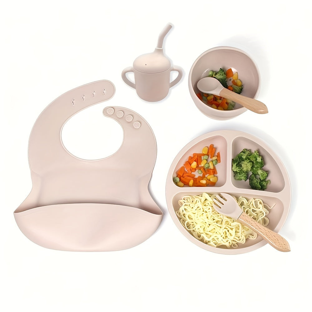 6-piece silicone feeding set with strong suction includes divided plate, wooden spoon and fork, microwave safe - great for self-feeding.