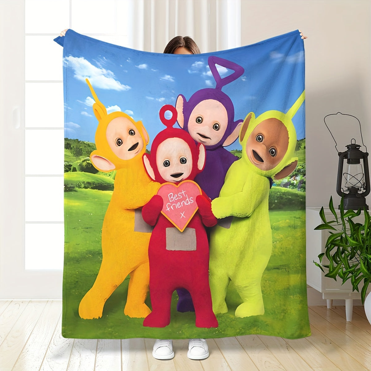 Soft HD digital print throw blanket inspired by Teletubbies, can be used on the sofa, bed, or for office naps. It is cozy, lightweight, and machine washable. Made of hypoallergenic polyester, it is ideal for all seasons and makes a great gift for friends