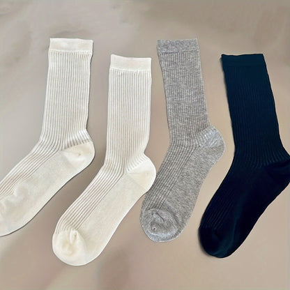 4 pairs of comfy mid-tube socks for women, with hollow out design for breathability.