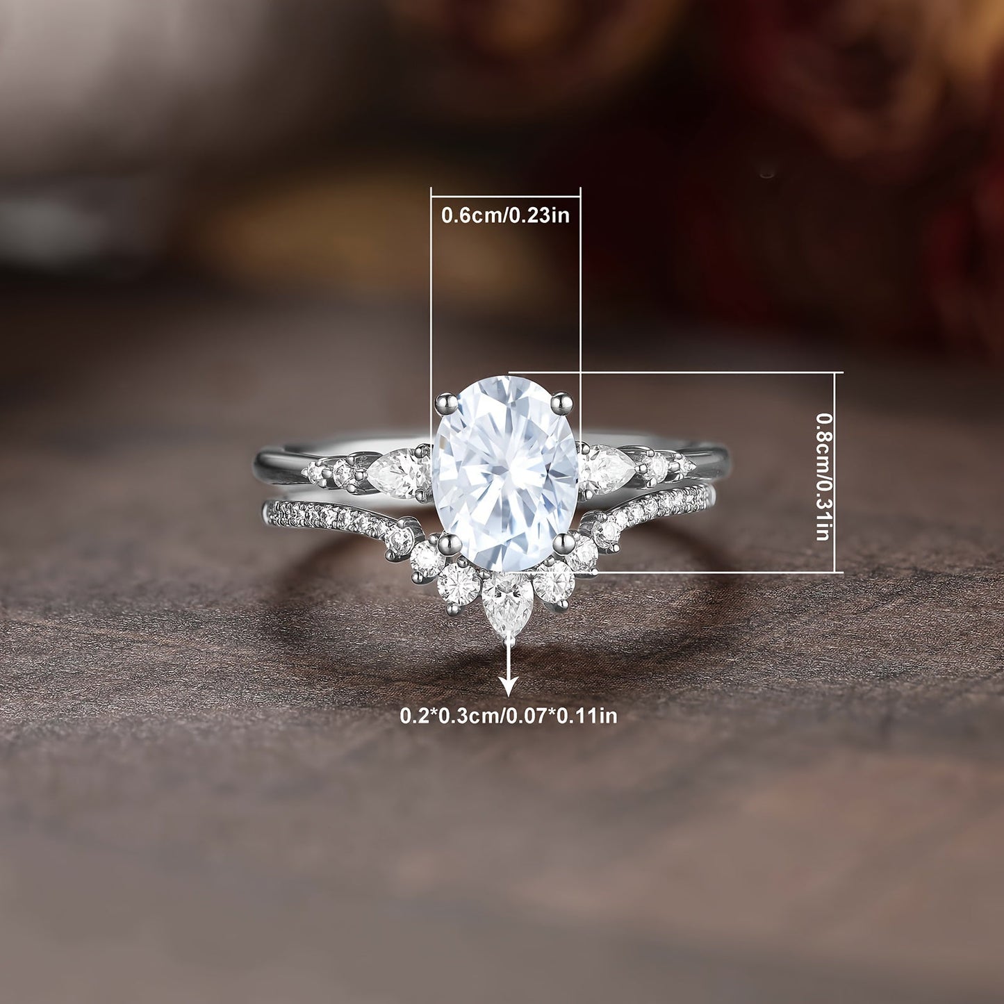 Two elegant and luxurious egg-shaped engagement rings for women, featuring an oval-shaped cubic zirconia center stone adorned with teardrop cubic zirconia. These exquisite and unique egg-shaped cubic zirconia women's wedding rings are perfect for