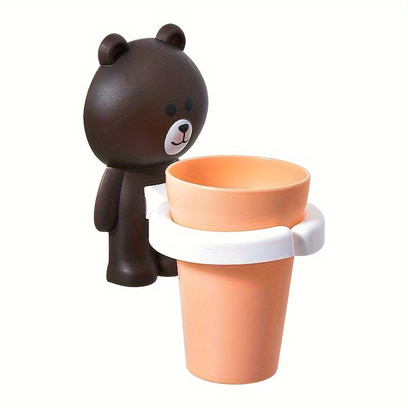 Wall-mounted bear toothbrush holder with cup - no drilling, space-saving bathroom organizer.