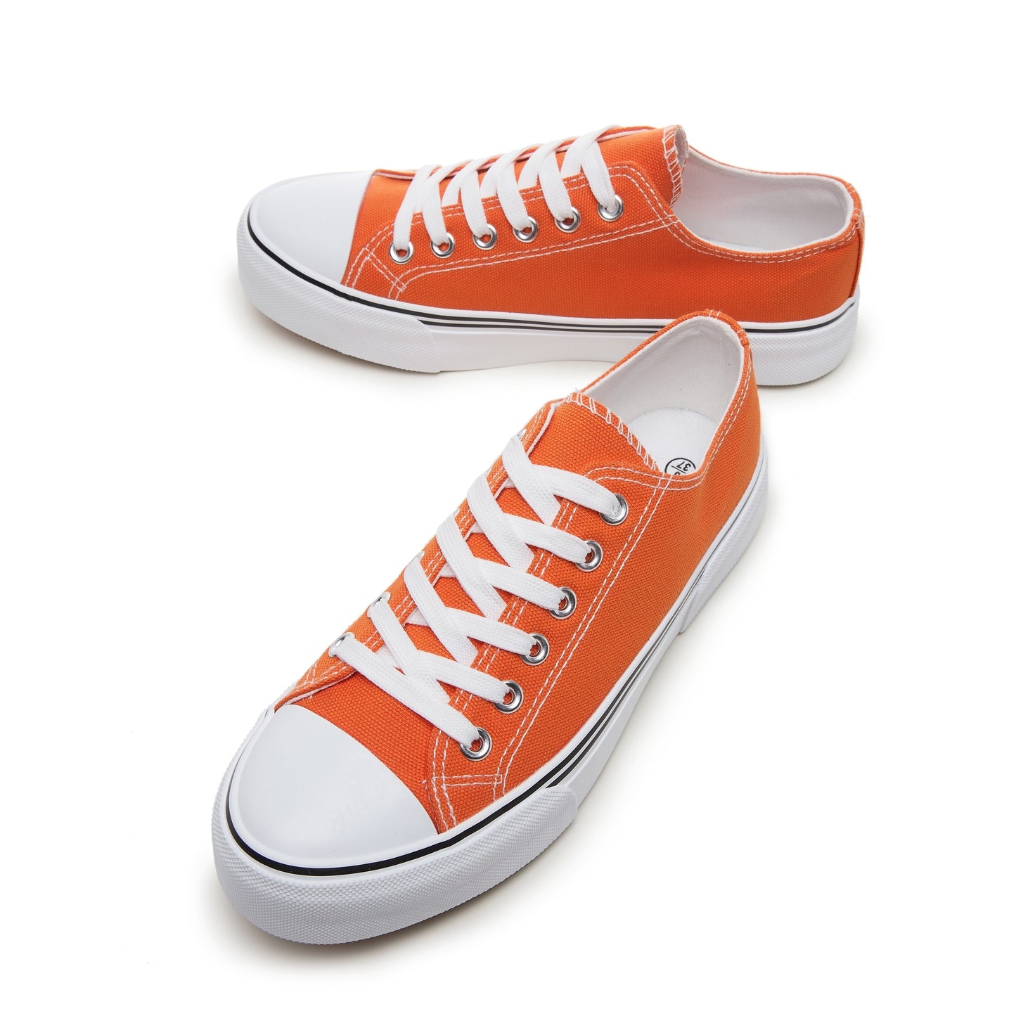 Women's casual canvas sneakers in solid color with plain toe, rubber lace-up design, machine washable fabric, and lightweight rubber sole. Suitable for all seasons.