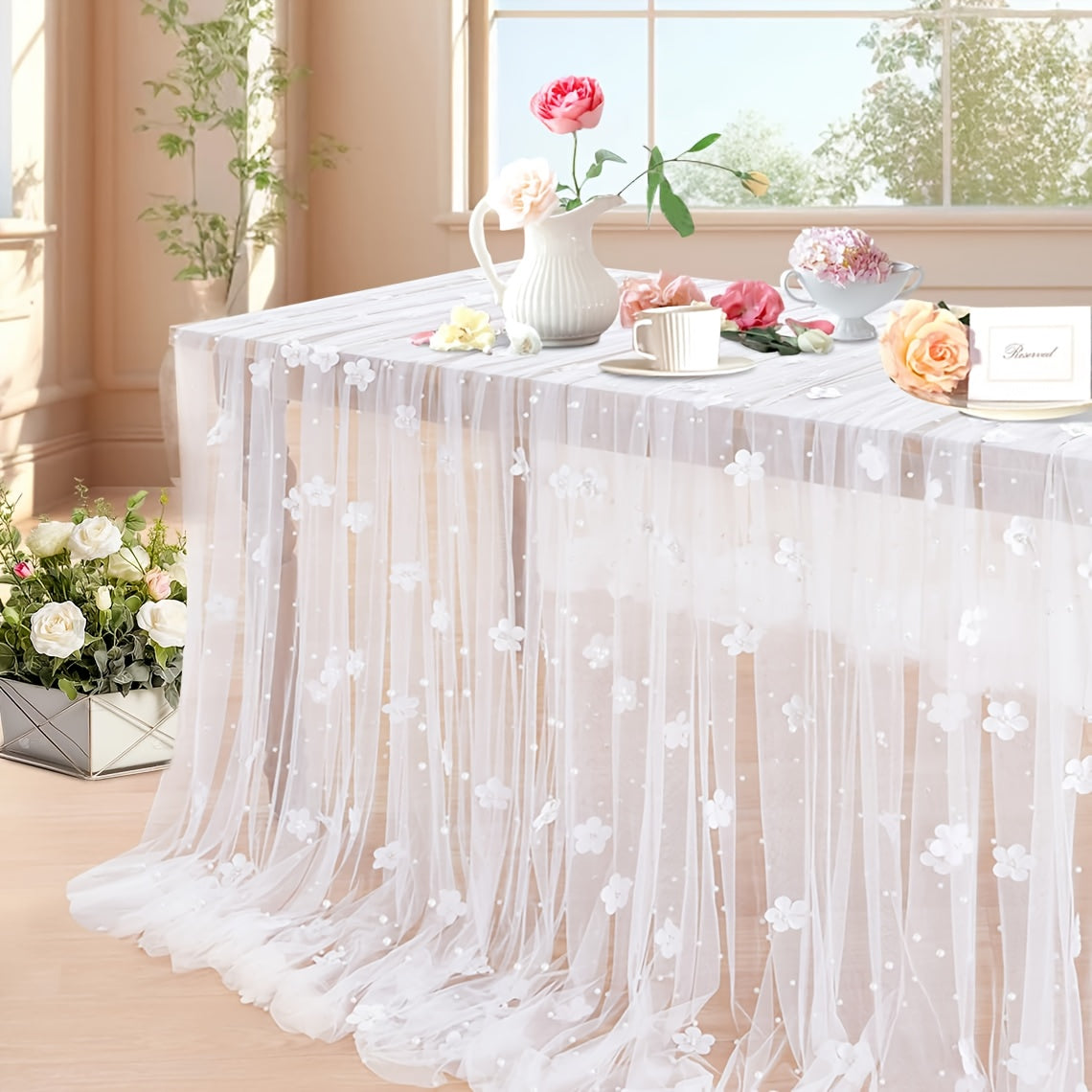 Elegant pearl bead tulle table runner, perfect for weddings and parties. Can also be used as a chair sash or backdrop drape. Made from 100% polyester fabric with delicate bead detailing.