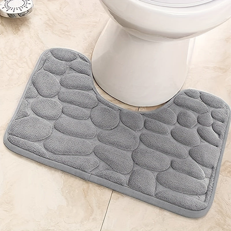 Soft and absorbent memory foam bathroom mat with non-slip backing. Machine washable and quick-drying. Suitable for bathroom, kitchen, laundry, bedroom, and shower.