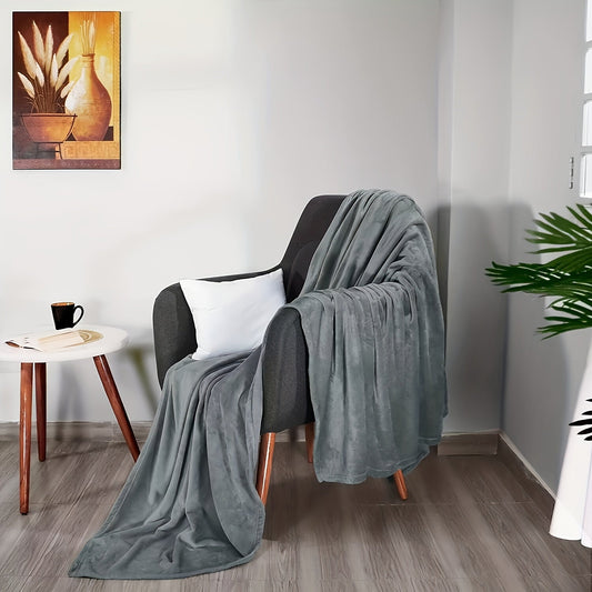 Solid grey throw blanket with a vintage style, featuring a 40 stick count. Perfect for all seasons and stain resistant, this knit fabric blanket is designed with a plain weave and movie theme. Made with anti-static microfiber fleece, this lightweight