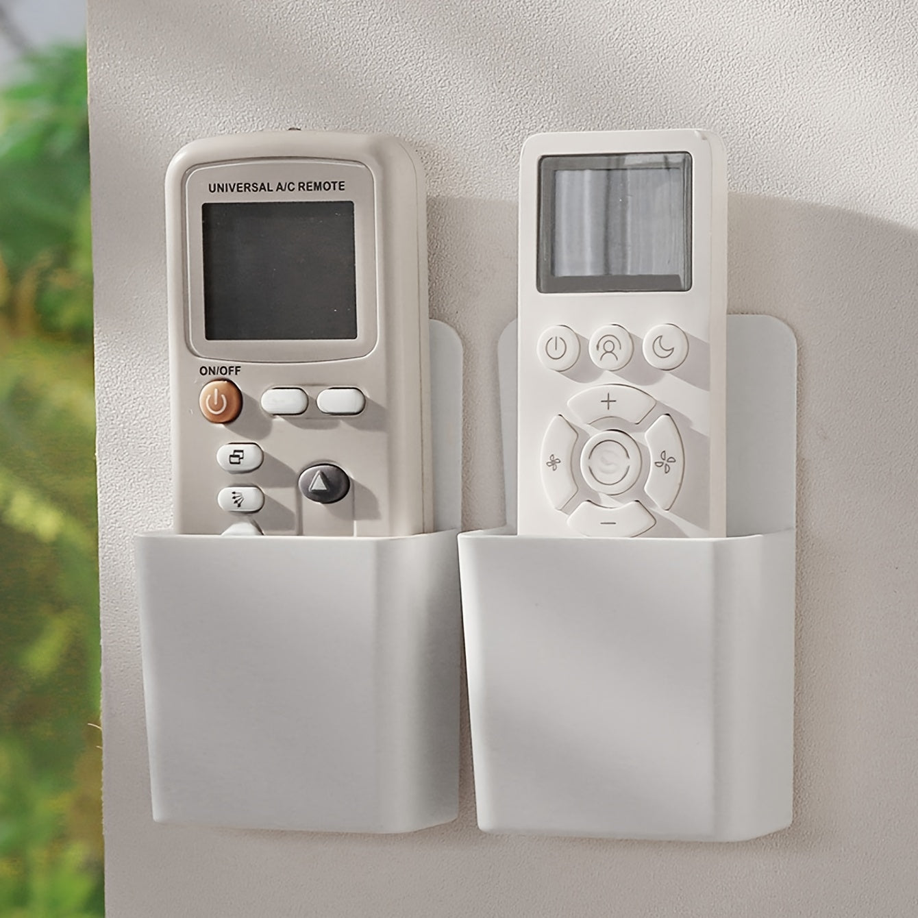 Wall-mounted remote control storage box for small items, ideal for household organization in various rooms.