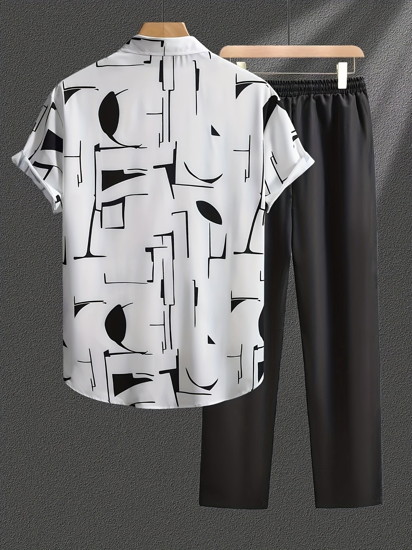 Casual geometric graphic print button-up shirt with lapels and short sleeves, paired with drawstring pants for outdoor activities.