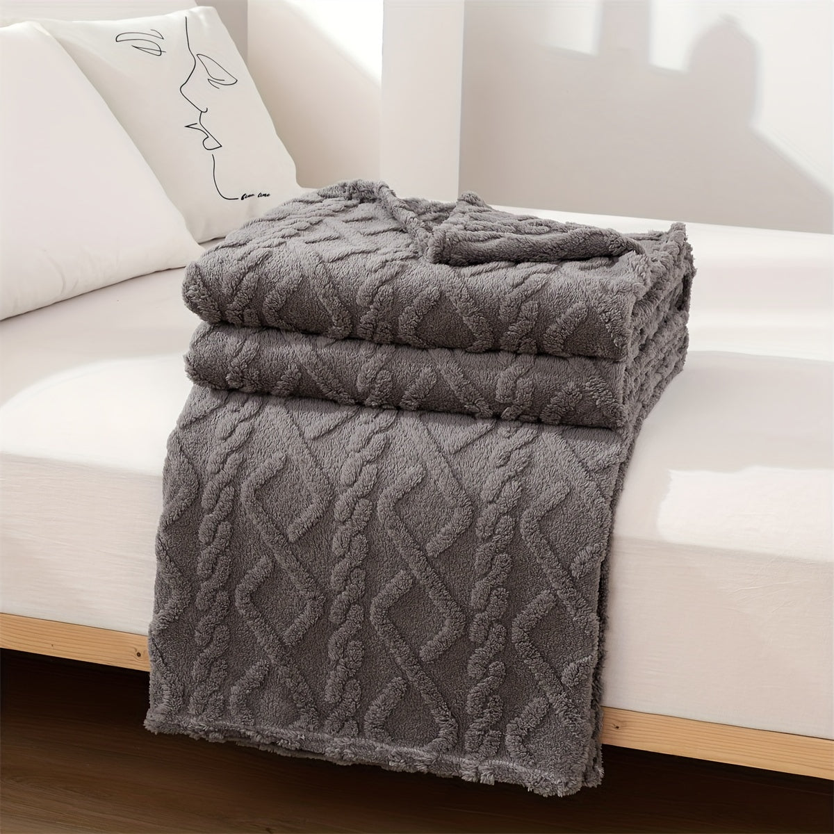 A cozy and versatile blanket with a sweater-like embossed design, perfect for New Year's, Chinese New Year, Valentine's Day, Mother's Day, and back-to-school occasions.