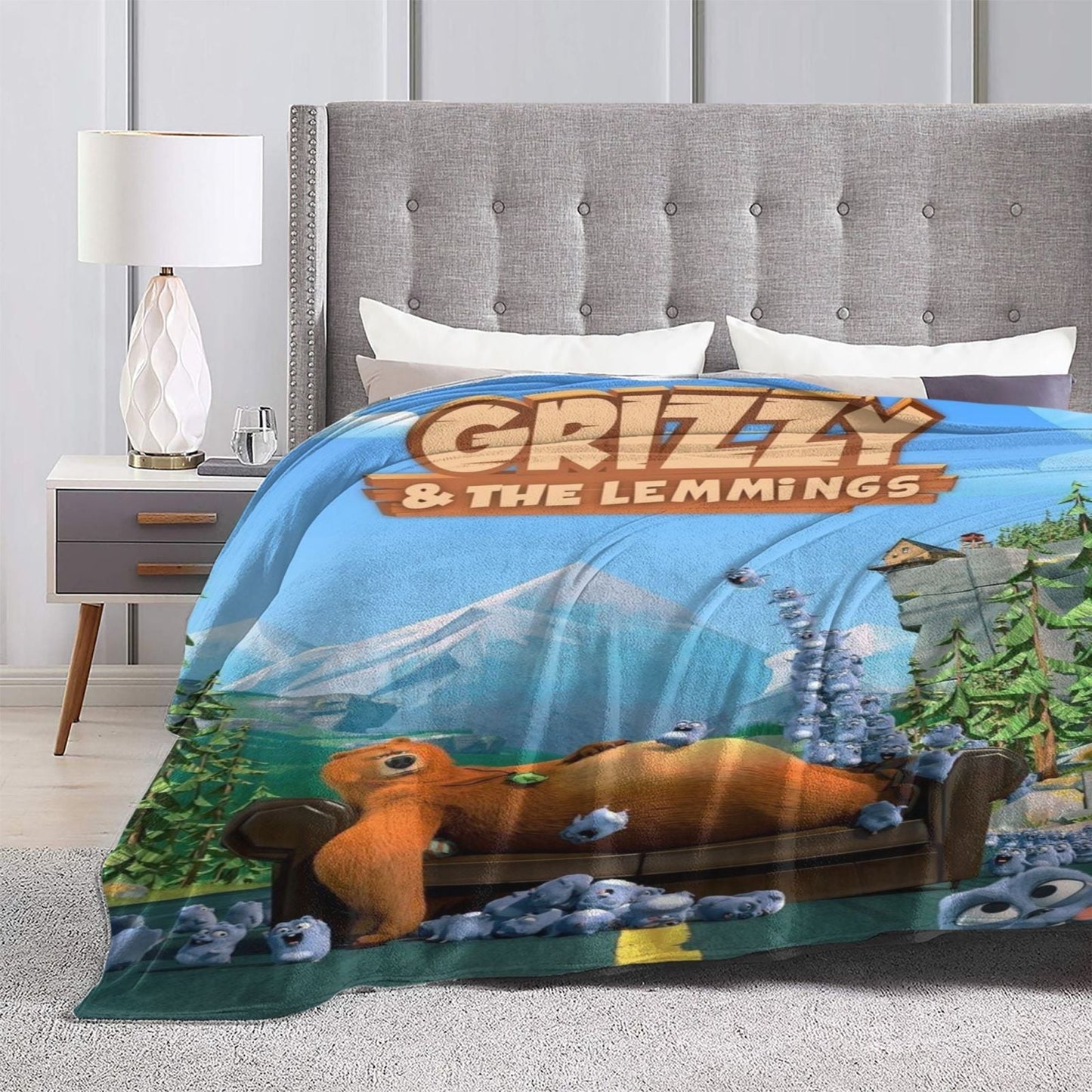 Soft polyester Grizzly & The Lemmings printed flannel throw blanket features a contemporary style with digital print and knitted craftsmanship. It showcases a charming design that is versatile for use on the sofa, bed, office, travel, and camping. This