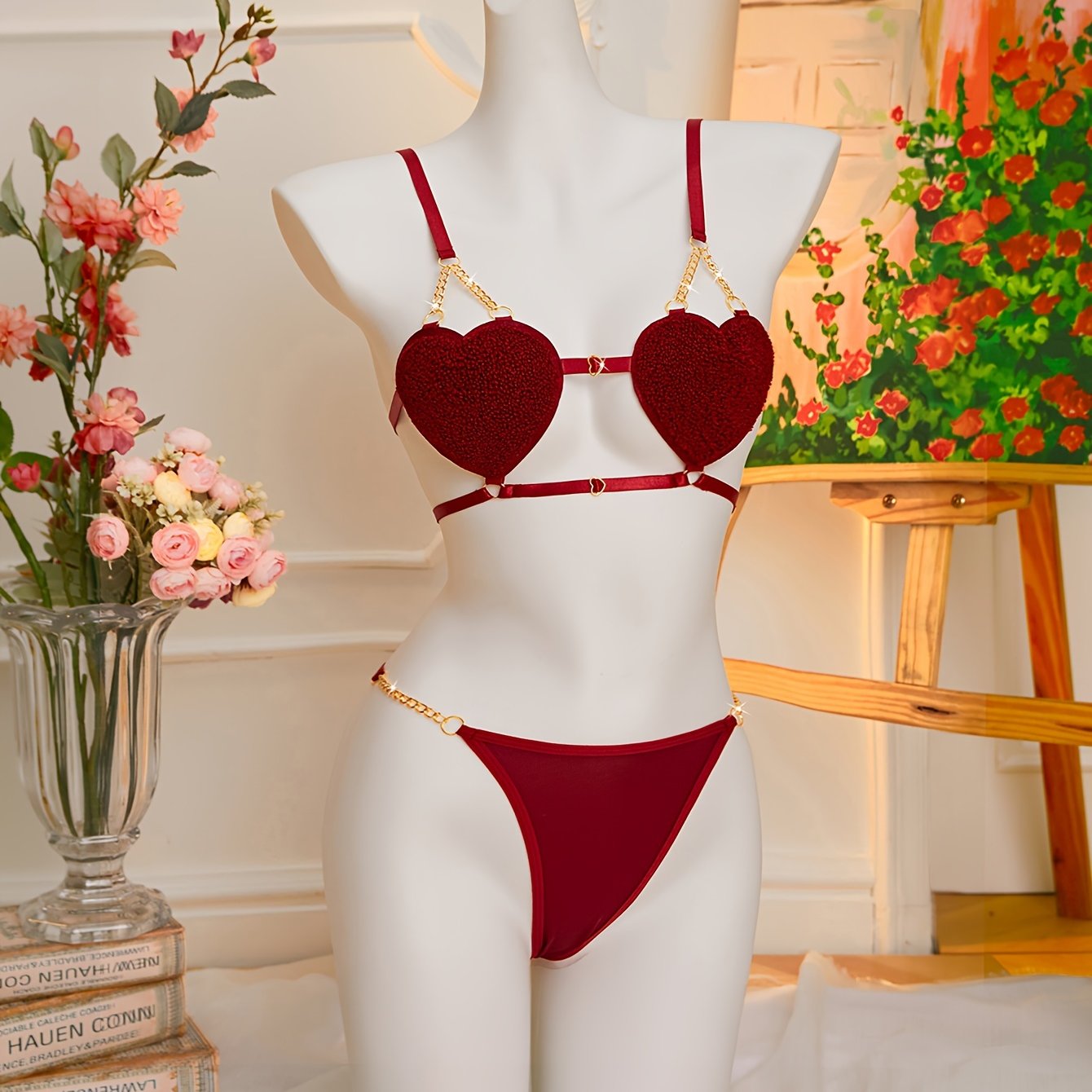 Golden chain lingerie set with heart-shaped double strap bra and thong for women.