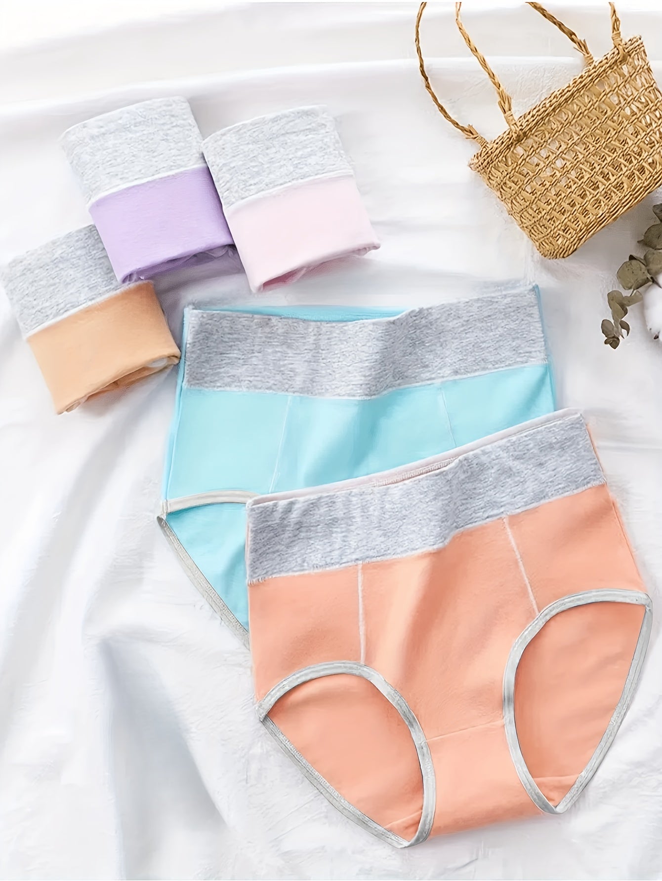 Five women's hipster panties in pastel color block design with stretchy, breathable fabric. Hand washable and comfortable fit with hipster cut and cute spandex blend.