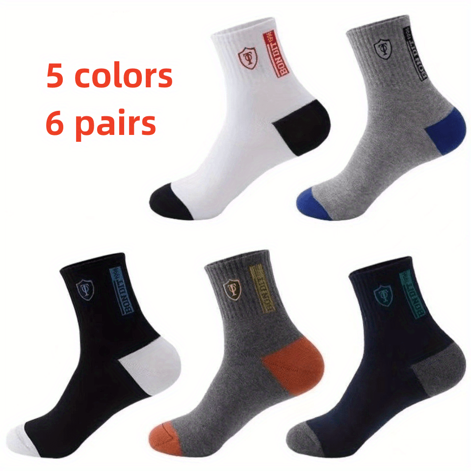 6 pairs of versatile mid-calf men's socks, ideal for sports and casual wear, designed for sweat absorption.