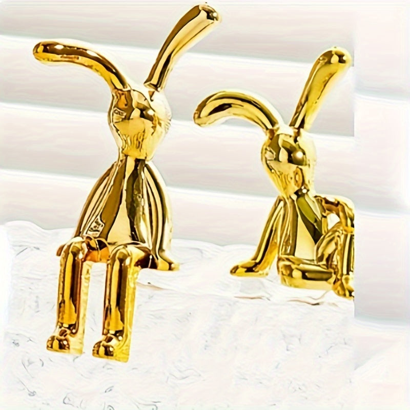 Two silver-plated resin rabbit ornaments perfect for any room, making a great Easter gift.