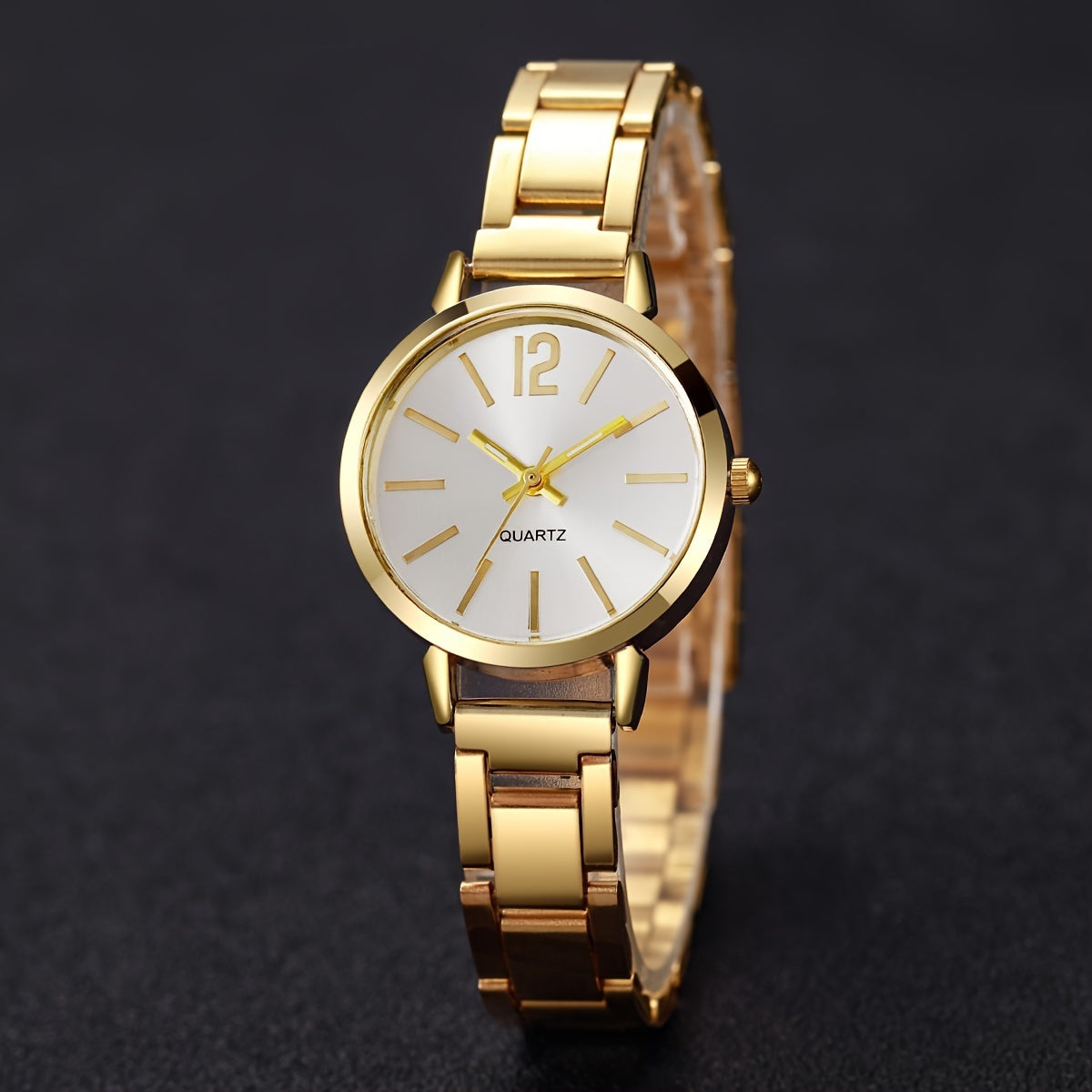 Elegant women's quartz watch and bracelet set with non-rechargeable battery, featuring a round alloy case and fashionable minimalist design. Stylish ladies' accessory (box not included).