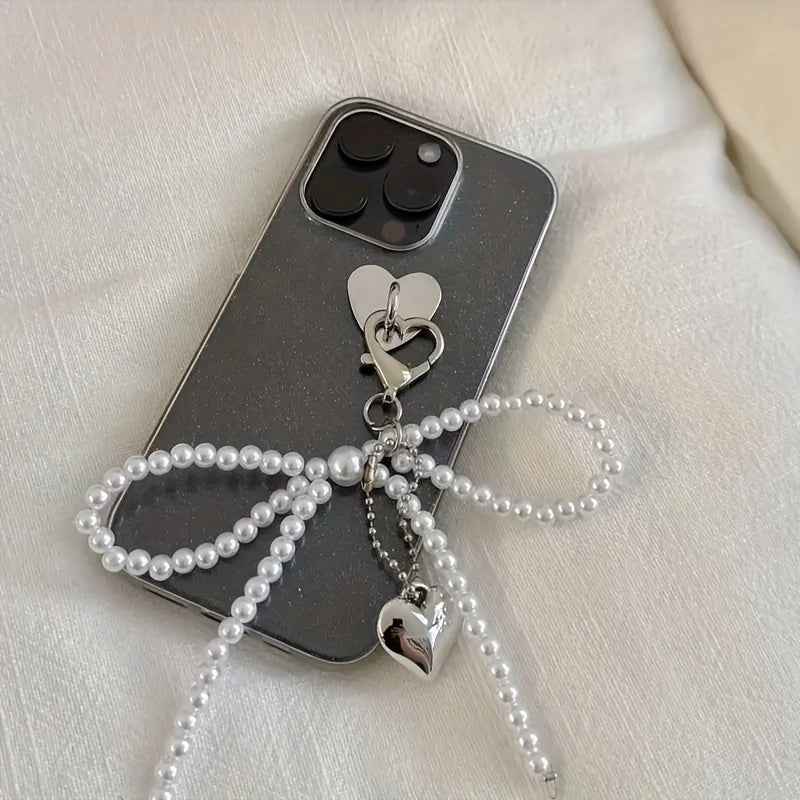 Large heart-shaped metal pendant with pearl bow - ideal for Valentine's Day. Versatile accessory for mobile phone cases, cameras, bags, and keychains. Perfect gift for women and girls.