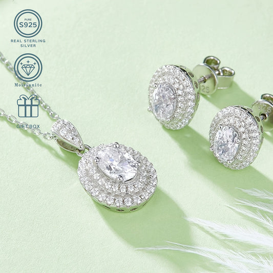 Elegant 925 Sterling Silver Moissanite Jewelry Set, Featuring 1.0 Carat Egg-Shaped Pendant and 0.5 Carat Earrings. This Sexy and Simple Style is perfect for Daily Wear or as a Wedding Accessory. Plated with 925 Silver, it makes an Ideal Gift for Mother's