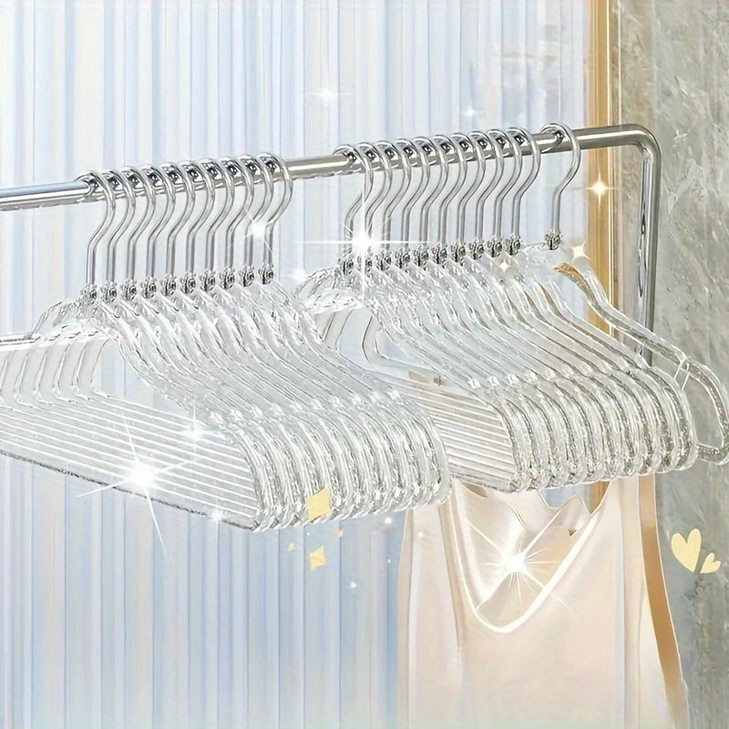 A set of 12 premium acrylic hangers with a non-slip, sparkling transparent design, providing a firm grip for wardrobe storage. These durable, thick hangers are perfect for bedroom closets, offering a traceless hanging solution.