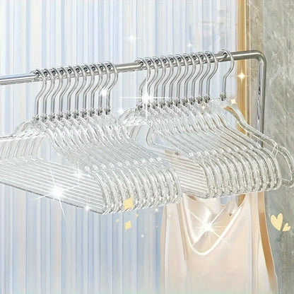 A set of 12 premium acrylic hangers with a non-slip, sparkling transparent design, providing a firm grip for wardrobe storage. These durable, thick hangers are perfect for bedroom closets, offering a traceless hanging solution.