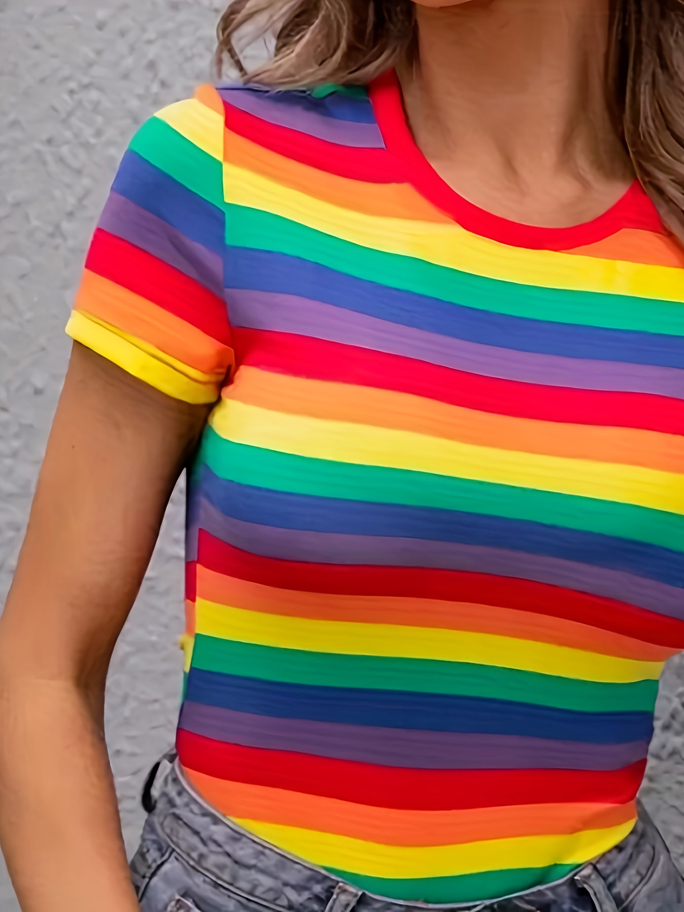 Machine washable women's rainbow stripe print t-shirt with color block detail.