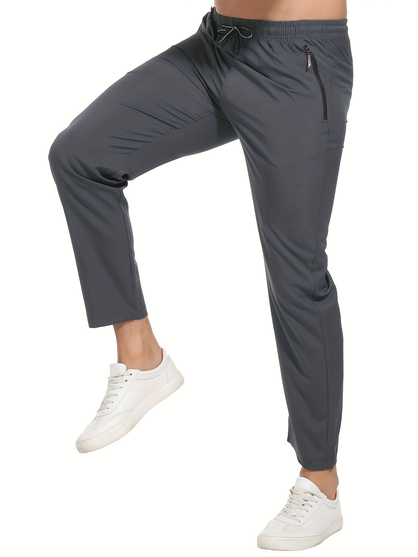 Breathable quick-dry joggers for men with drawstring, zipper pockets, stretchy, lightweight design for running, training, and outdoor activities by EIKELAND Oakspirit.