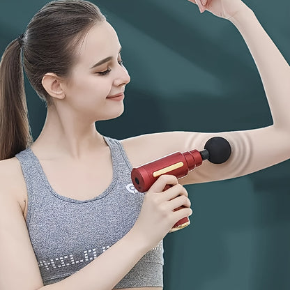 Handheld percussion massager with sleek black and golden design, 4 replaceable heads, 6-speed adjustment, and quiet brushless motor. USB rechargeable with 800mAh lithium battery for full