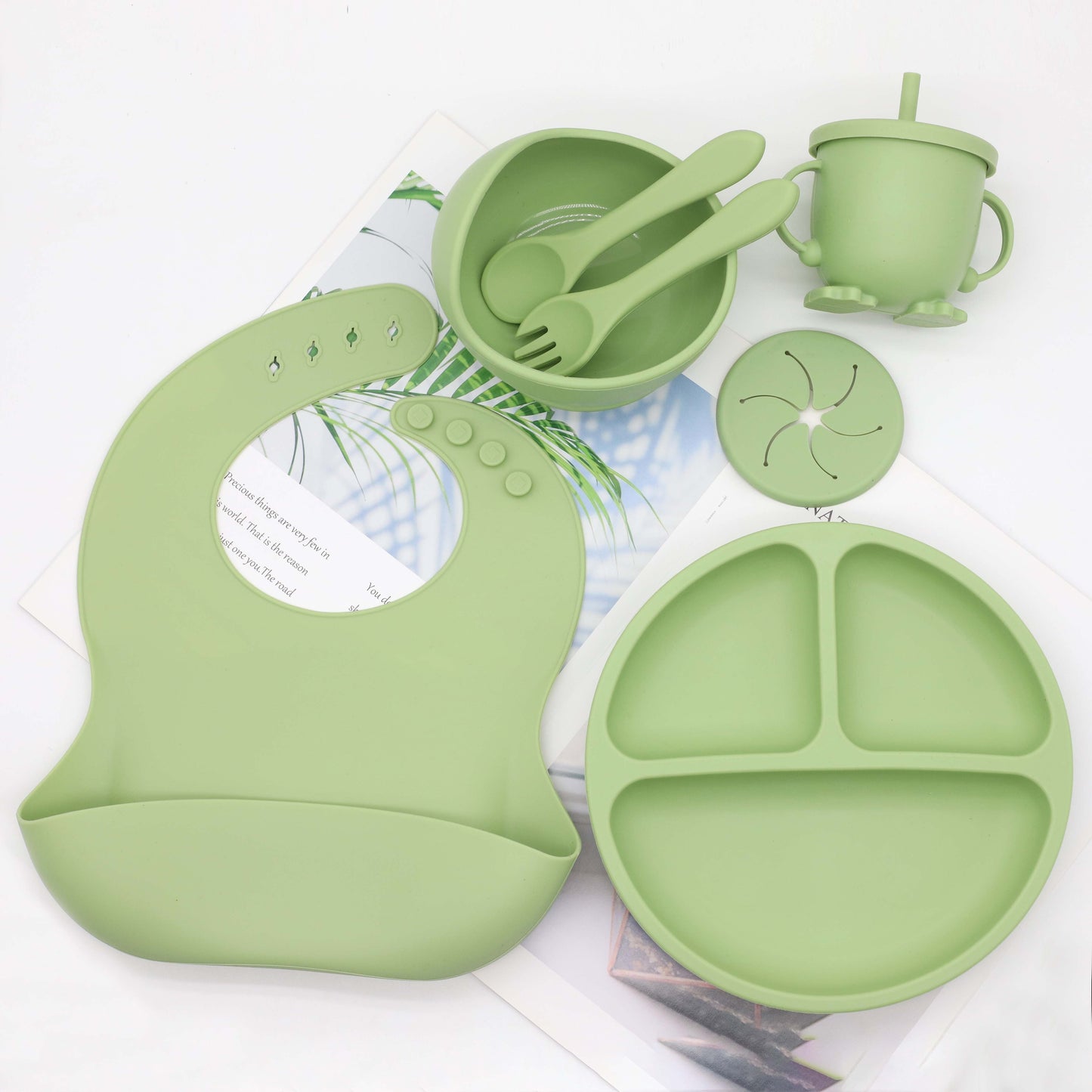 6 piece set of Silicone Feeding Items, featuring a Silicone Bib, Silicone Suction Plate, Silicone Suction Bowl, 2-in-1 Drinking Training Cup. Made of soft and safe, food-grade silicone that is BPA-free. Perfect Easter gift idea.