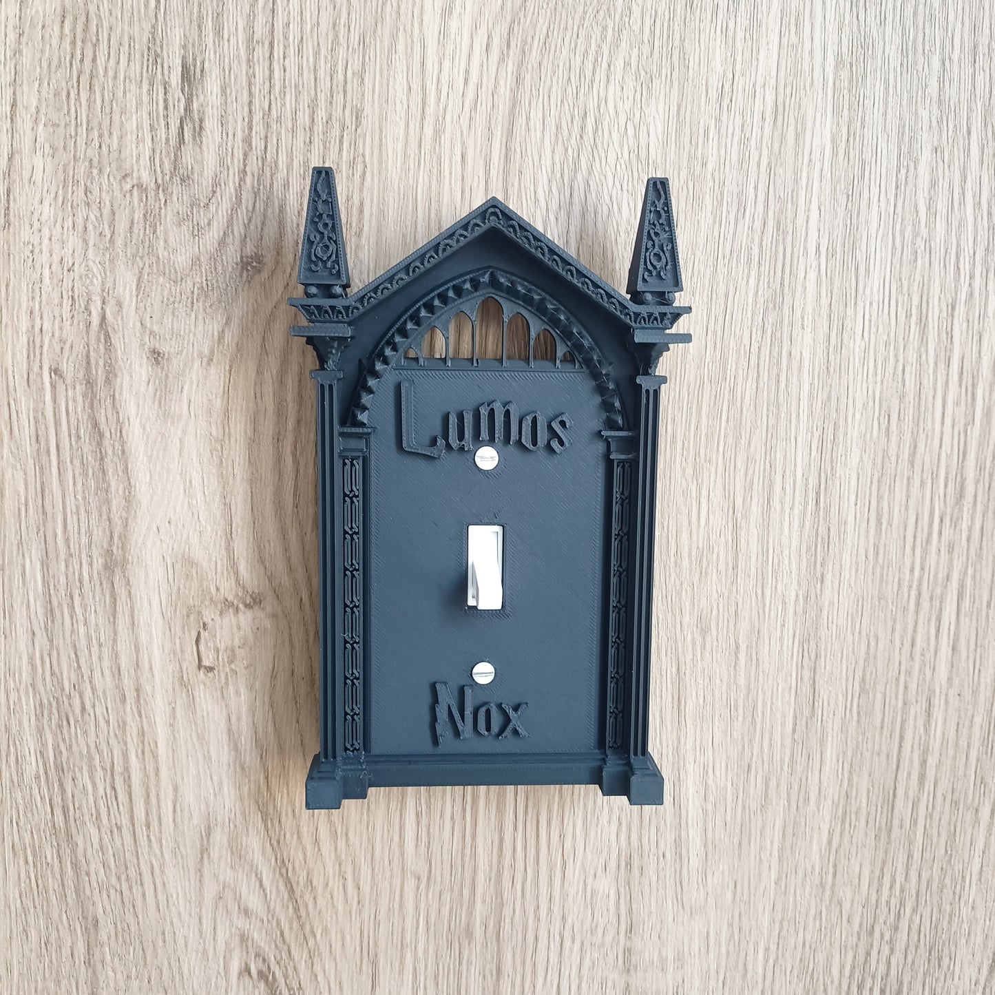 Easy-install 3D printed light switch cover for Halloween and holiday decor; no batteries needed. Unique black wall art for home, Halloween decorations.