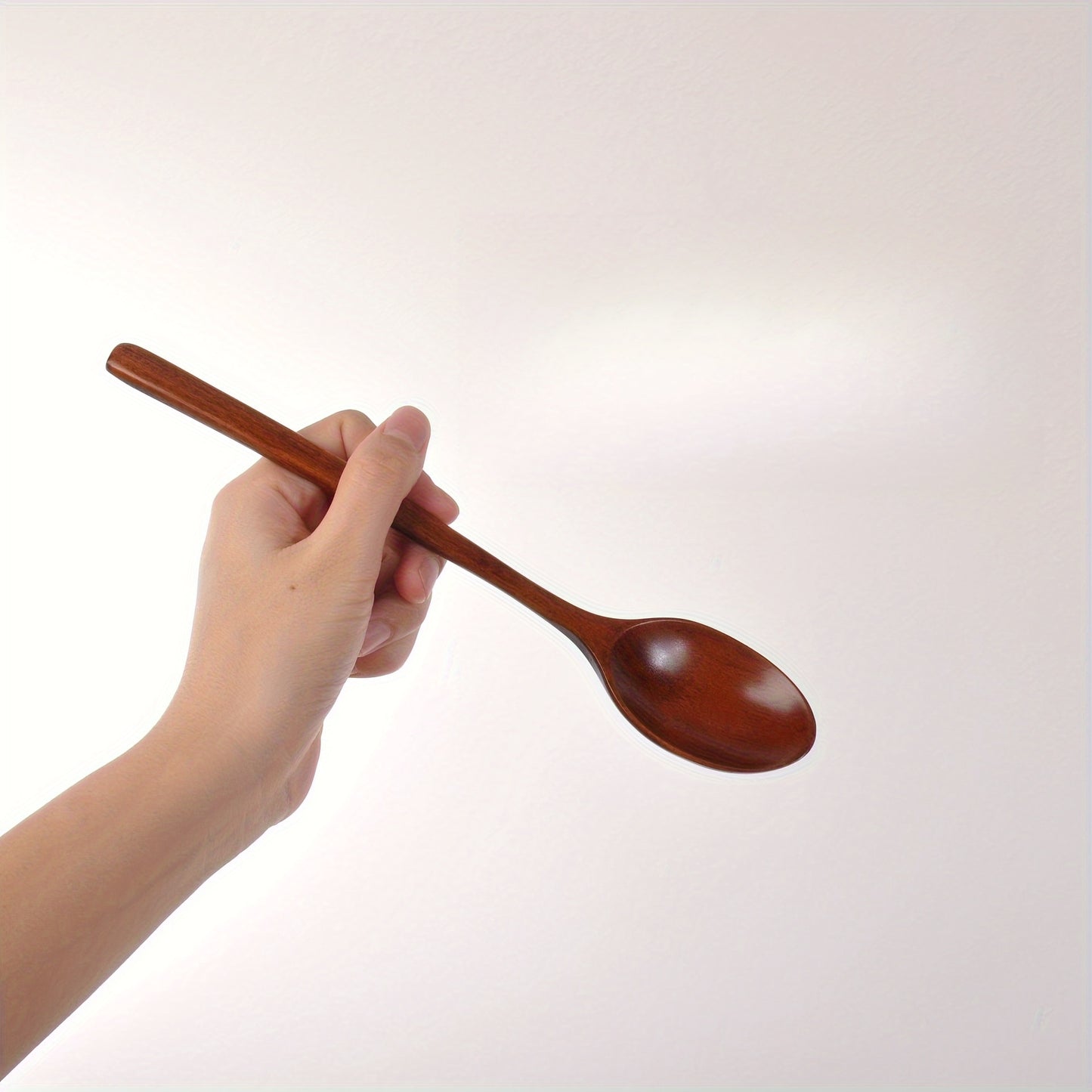 Multi-purpose 23.5cm long-handle wooden spoon ideal for kitchen, restaurant, camping, and picnics.