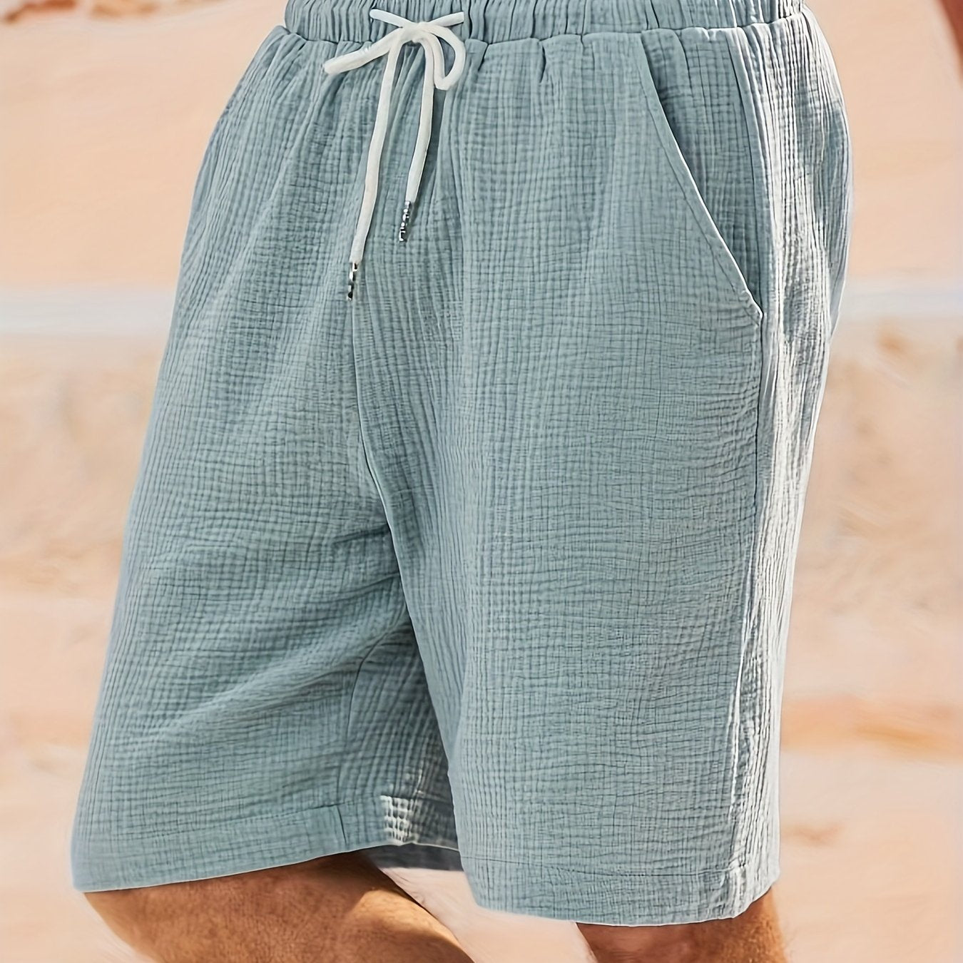 Men's solid color woven casual shorts with pockets, loose fit, perfect for beach, vacation, or weekend casual wear.