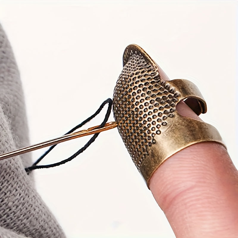 Handmade copper finish thimble with adjustable size, anti-slip finger cap for sewing.