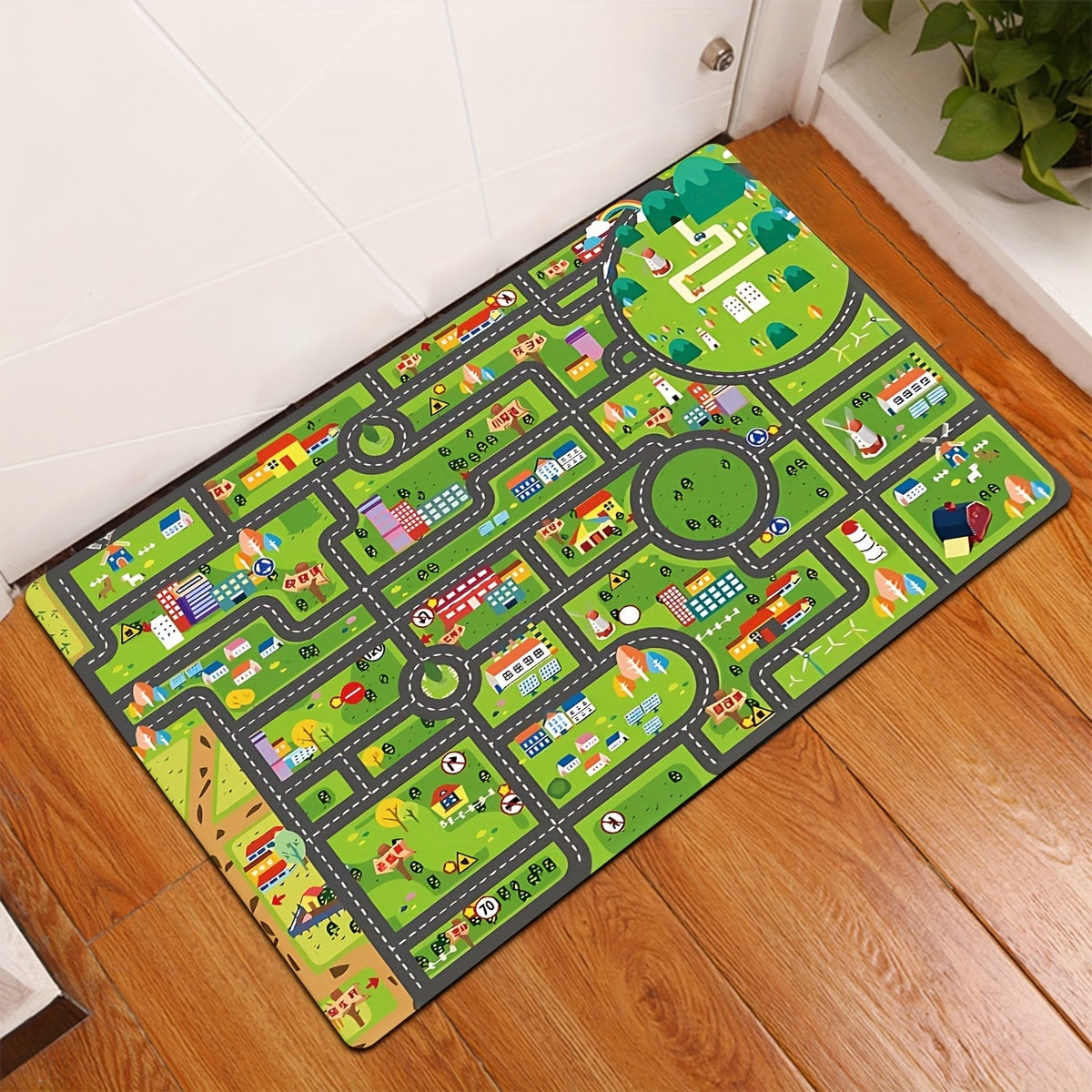 Get ready for exciting adventures with the Urban Roadscape Youngsters' Play Mat! This soft and thick flannel rug provides anti-fatigue support and is perfect for use in the kitchen, bathroom, or living room. With its non-slip design, machine washable