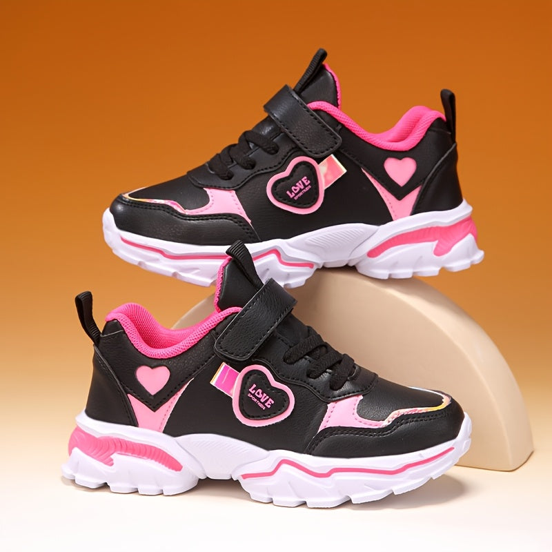 Stylish black and pink sneakers with glow-in-the-dark and shock-absorbing features, ideal for outdoor and casual activities.