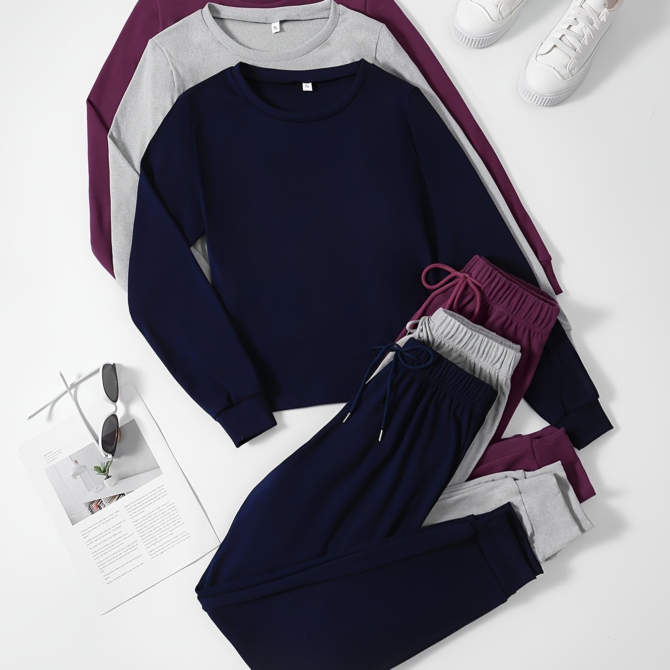 Cozy 3-piece women's loungewear set for fall with long sleeve top and jogger pants.