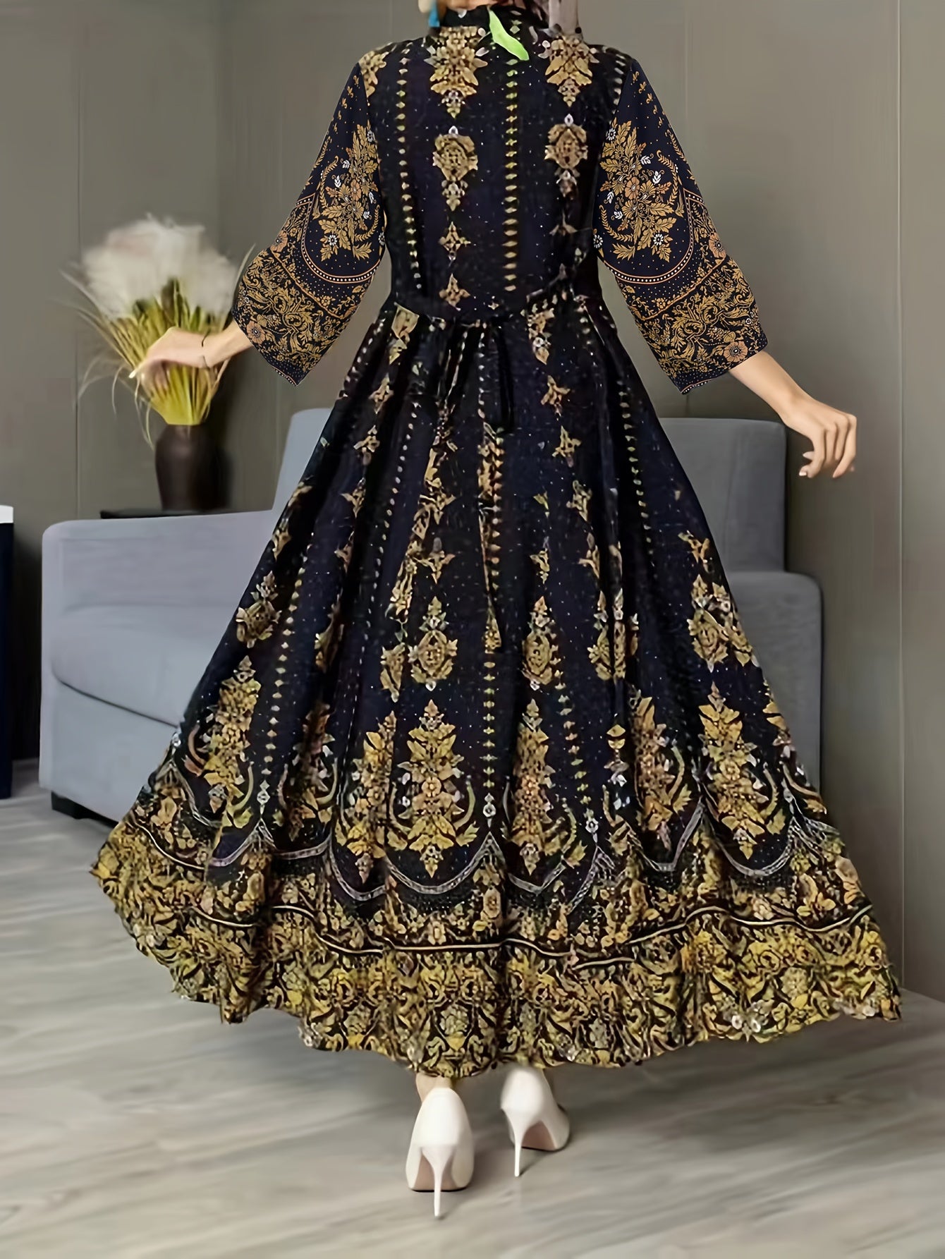 Elegant ethnic floral print maxi dress with V neck and 3/4 sleeves, perfect for vacations.