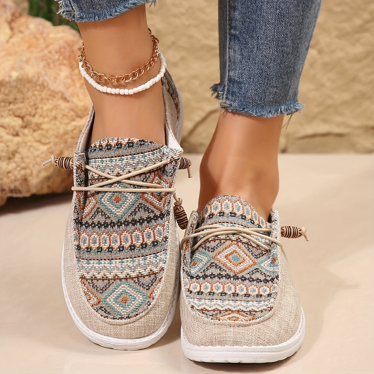 Casual lace-up canvas sneakers with ethnic print for women.