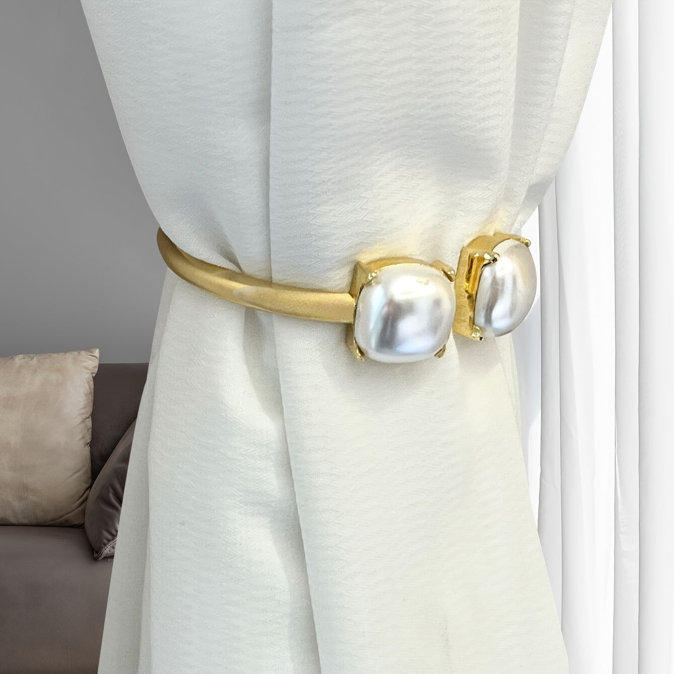 Modern minimalist curtain tieback with easy installation, suitable for bedroom, living room, and home decor.