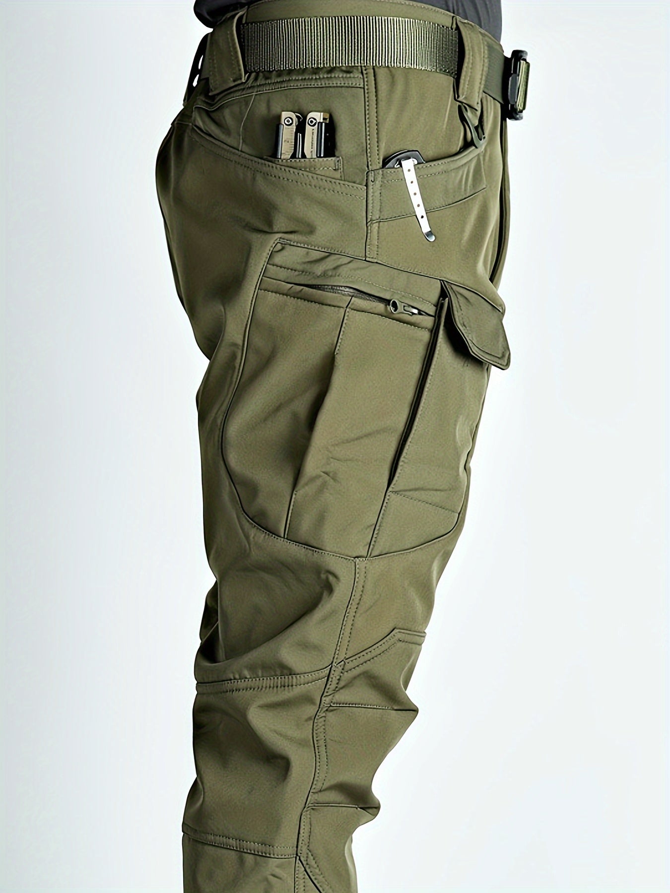 Men's tactical jacket and cargo pants set with fleece lining - perfect for outdoor activities in cold weather.