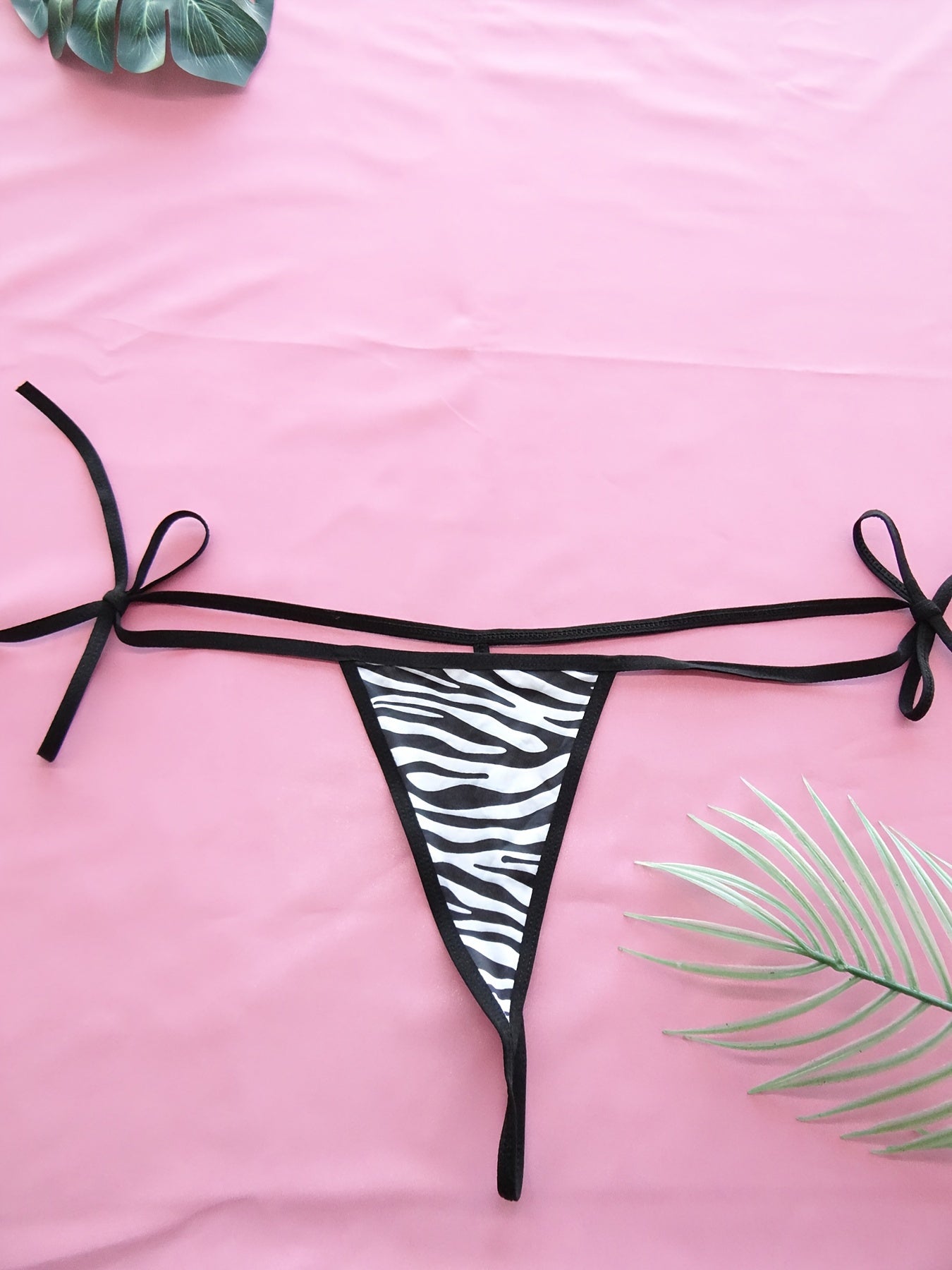 Women's zebra print bikini in sizes S/L, comfortable fit.