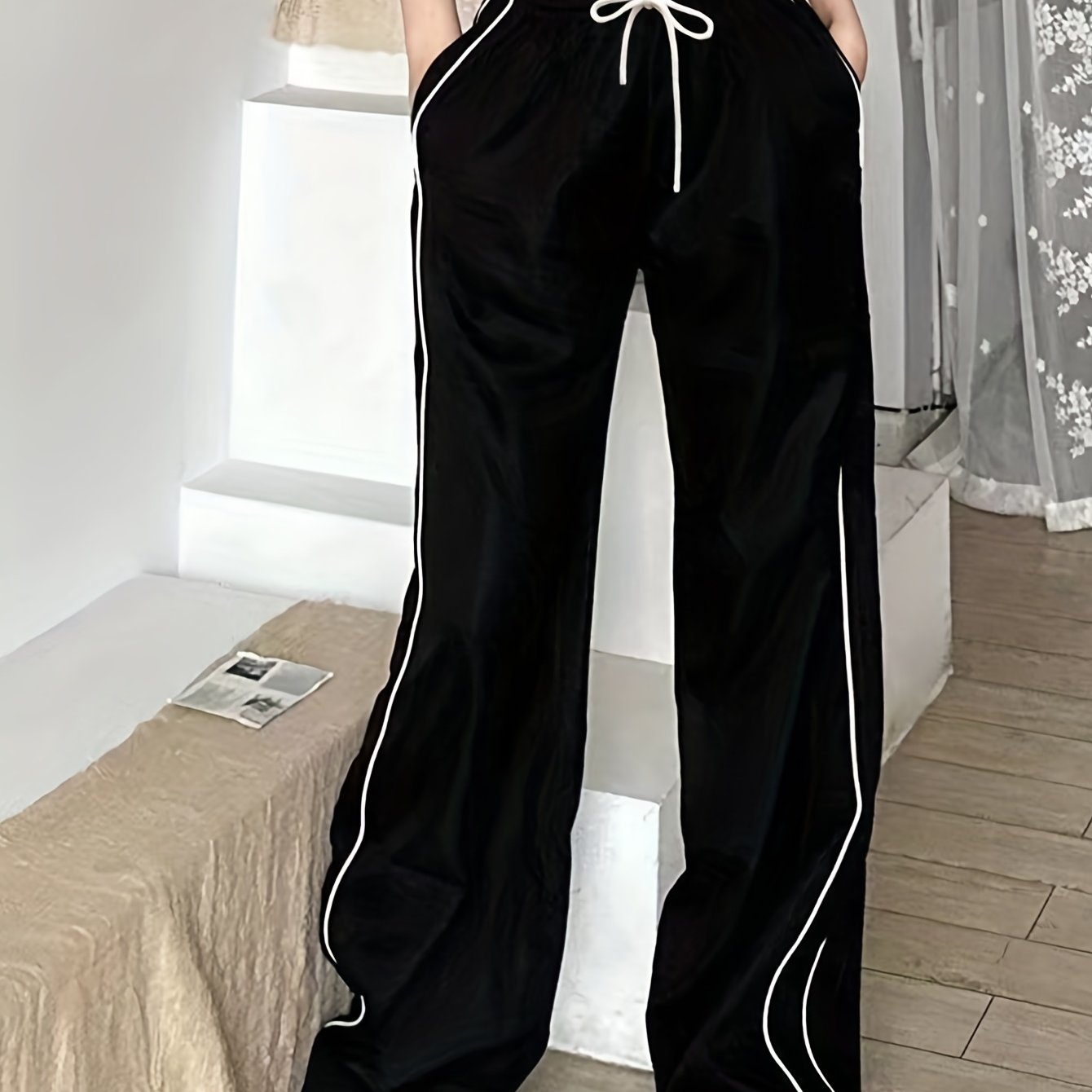 Y2K baggy pants with contrast drawstring waist and slant pockets for women.