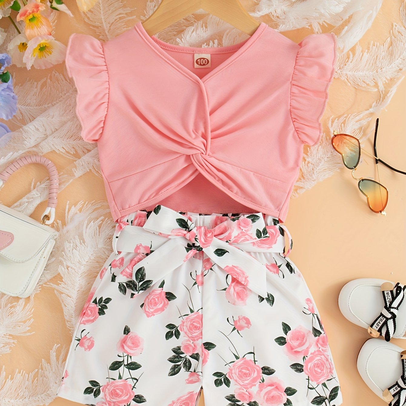 Girls' summer casual outfit with lace sleeveless top and printed flower shorts with belt.