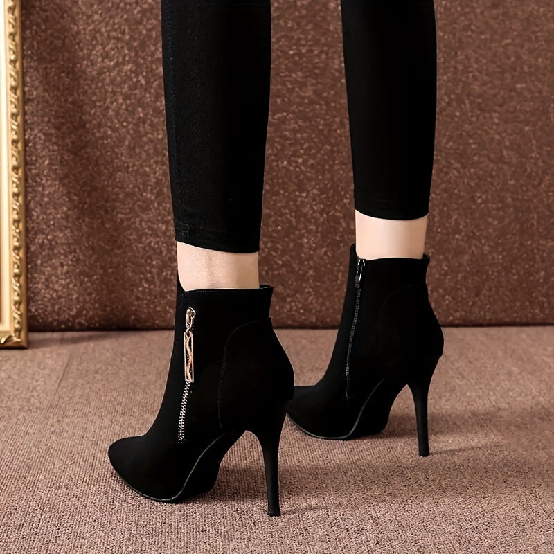 Stylish black high-heel ankle boots with pointed toe and stiletto heel, featuring a flannel upper and side zipper closure. Perfect for parties, weddings, and everyday wear in the fall