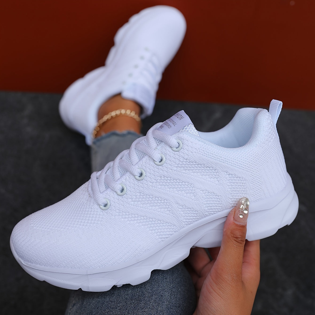 Breathable women's sneakers for casual outdoor activities, lightweight and low-top for running.