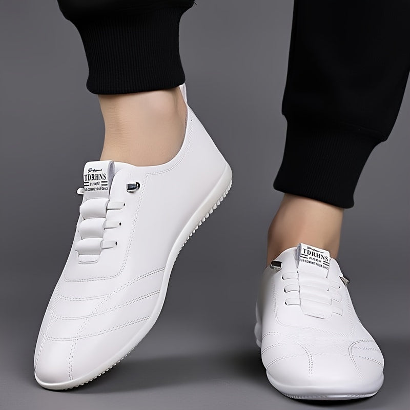 Low top slip-on sneakers with graphic PU upper, fabric insole & lining, and rubber sole for men's fashion.