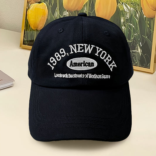 Polyester baseball cap with embroidered 1989 NY lettering. Hand wash only. Lightweight and non-stretch. Suitable for spring or autumn casual wear in a hip-hop style. Unisex design fits all