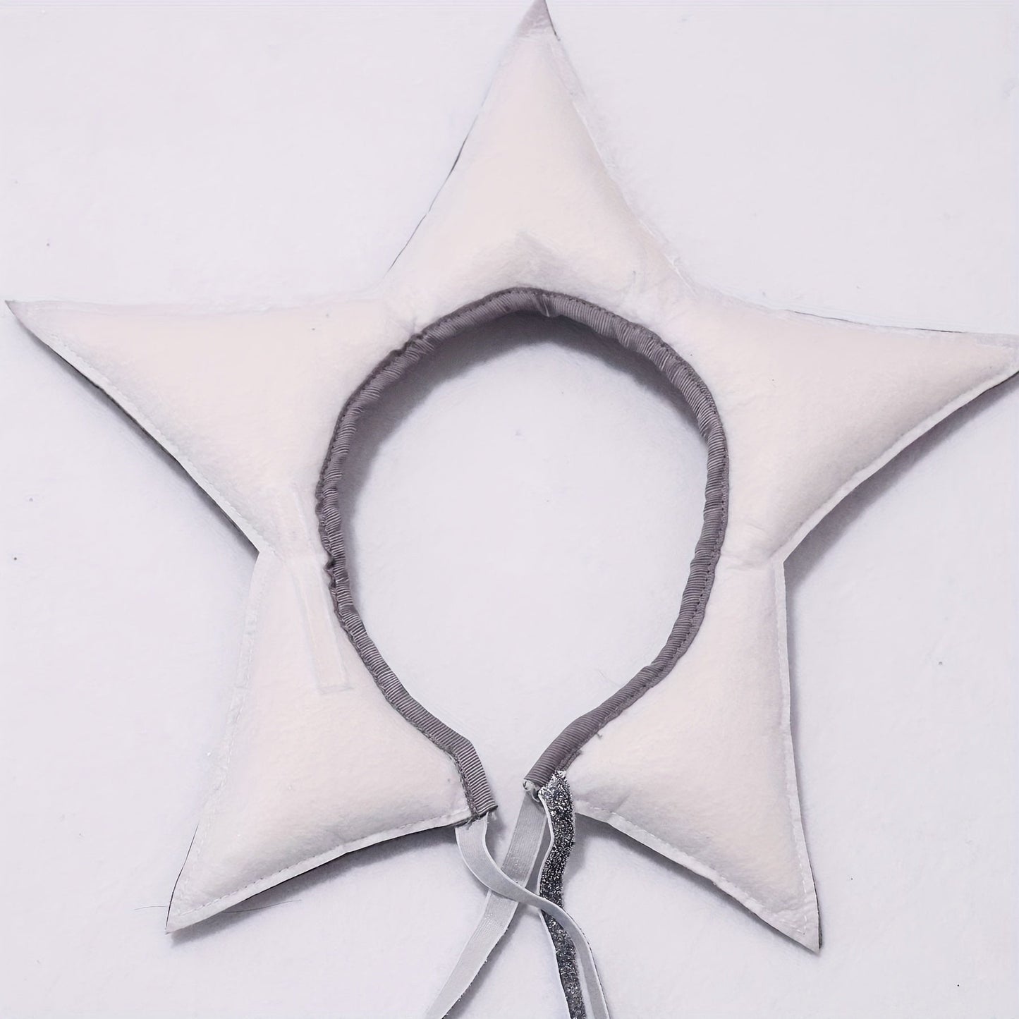 Silver-grey Christmas tree and star hair accessory, perfect for young ones, ideal for birthday parties and photoshoots - a cute fairy tale costume headpiece.