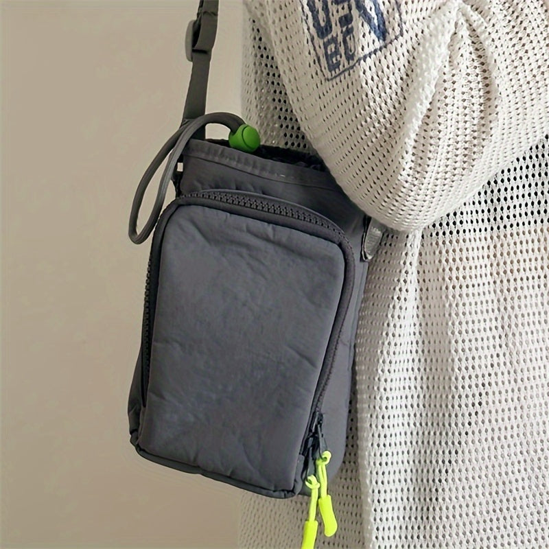 Nylon crossbody bag with water bottle and phone pockets, available in 5 colors, with zip closure.