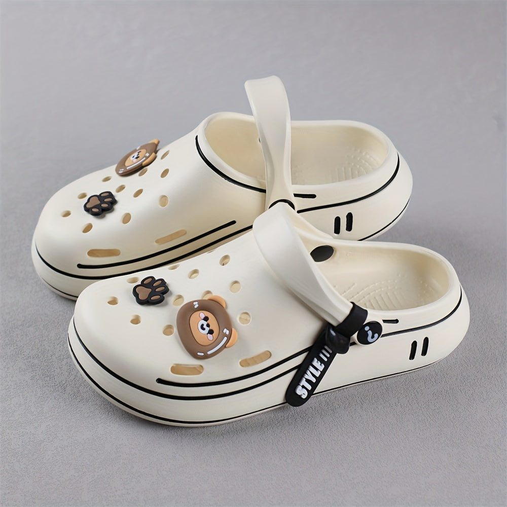 Durable outdoor slippers for boys featuring cartoon theme and comfy sole.