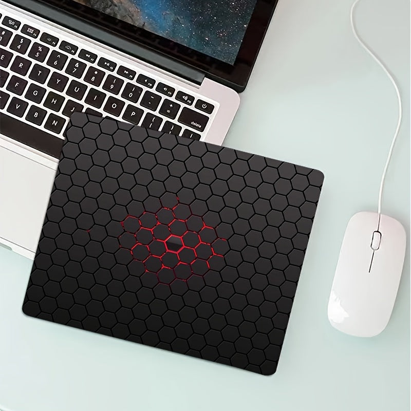 Hexagonal patterned rubber mouse pad for office or gaming, measuring 17.78x21.84 cm.