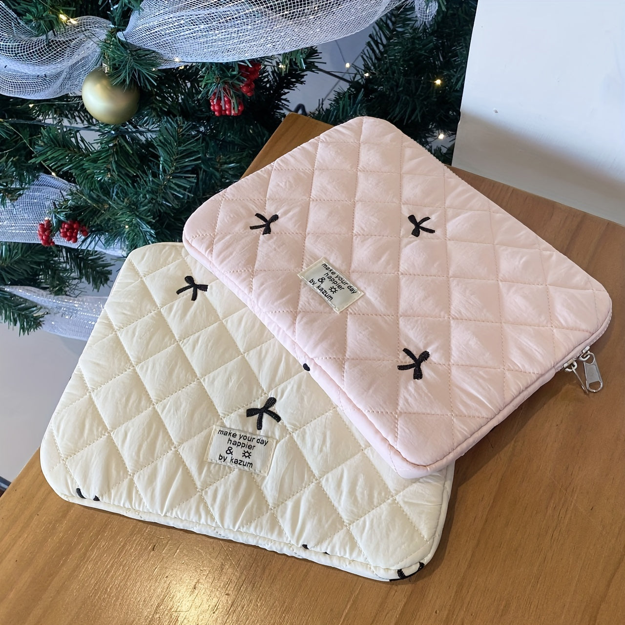 One laptop bag with ballet style bow embroidery, suitable for various devices.